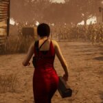 Ada in a red dress in a cornfield